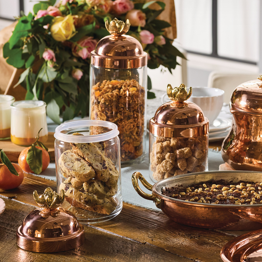 Lotus glass jars
Perfect for storing sugar, dried goods, tea bags, coffee, and more. The solid copper lid is topped with a lotus-shaped knob, designed to beautifully complement the Tea Kettle and Roaster from the same collection.