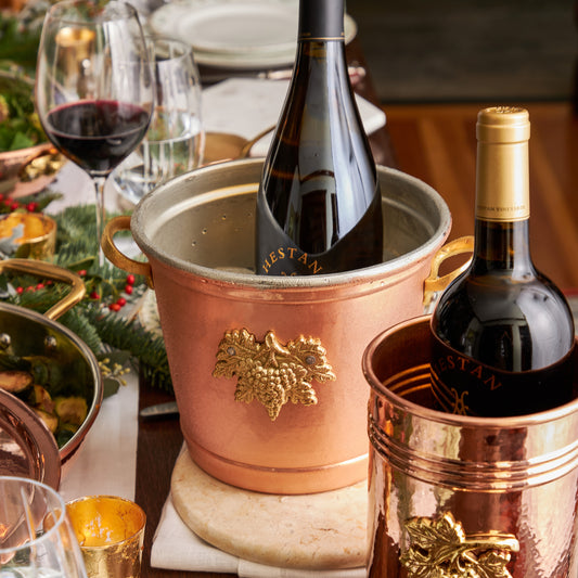 Hammered copper 3.5 Qt Round Wine Bucket lined with high purity tin applied by hand over fire and bronze handles, from Glamstore Historia collection