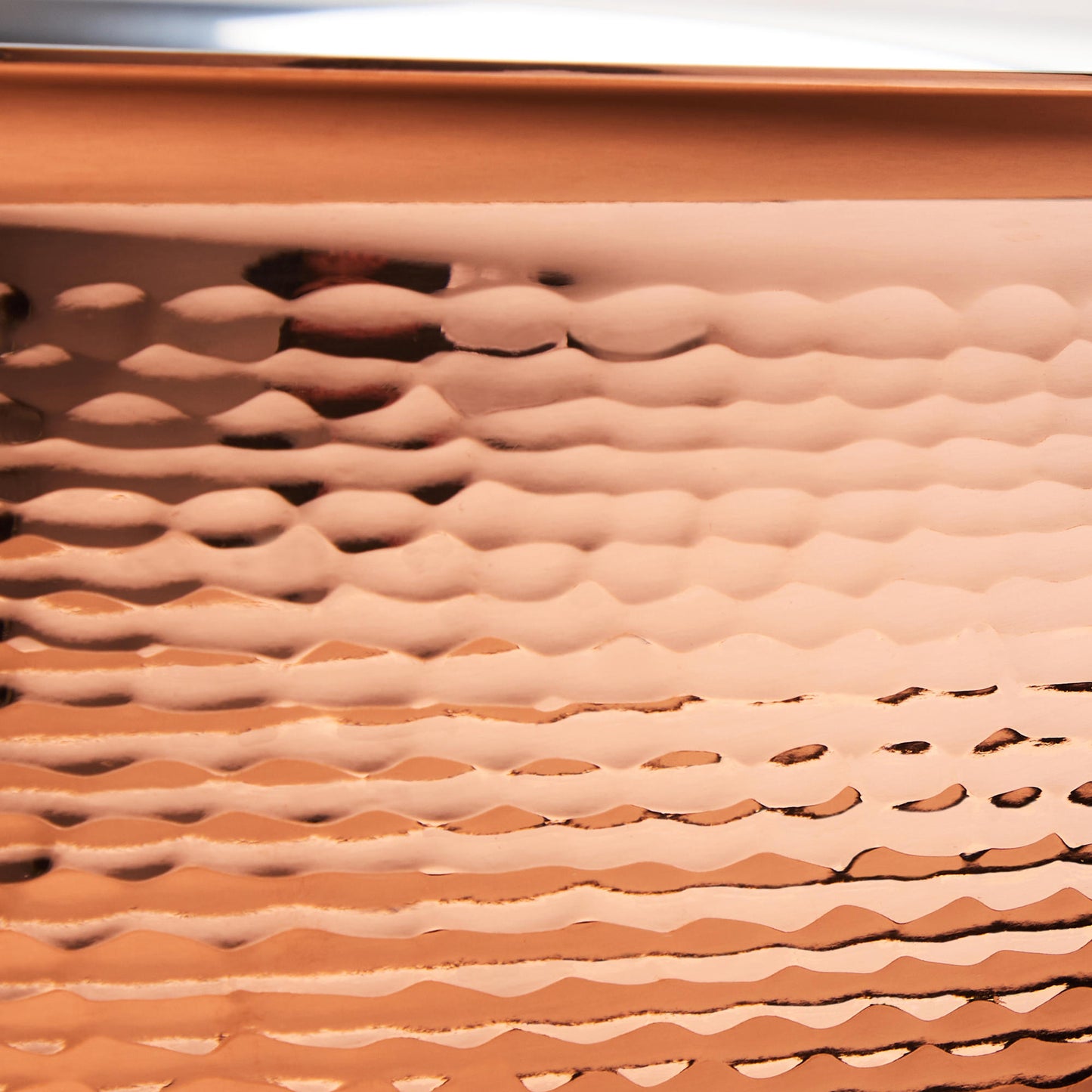 Hammering increases strength and beauty of copper clad with stainless steel braiser