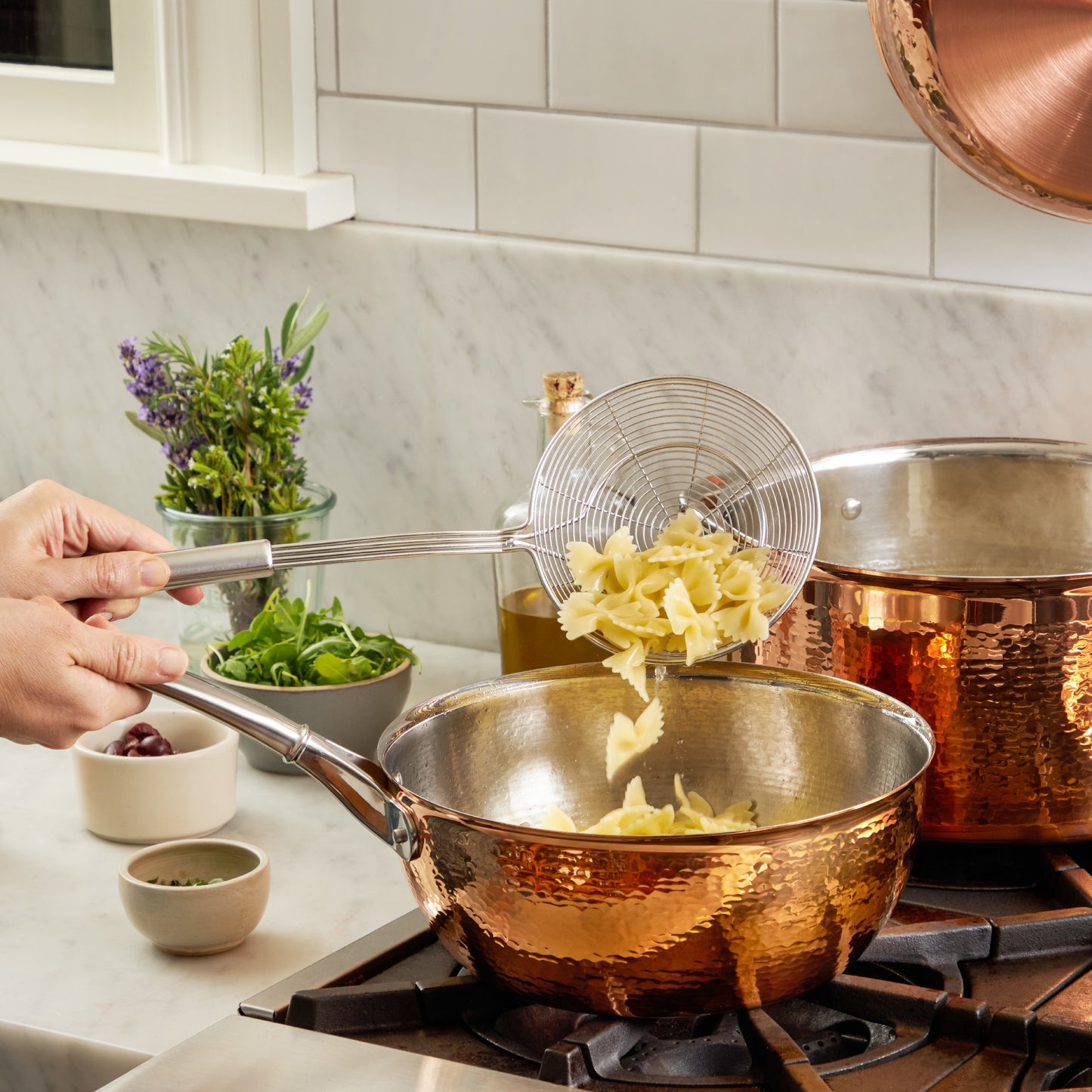 Chef's pan in hammered copper with stainless steel lining