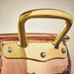 Beautiful bronze handle on Historia hammered copper cookware