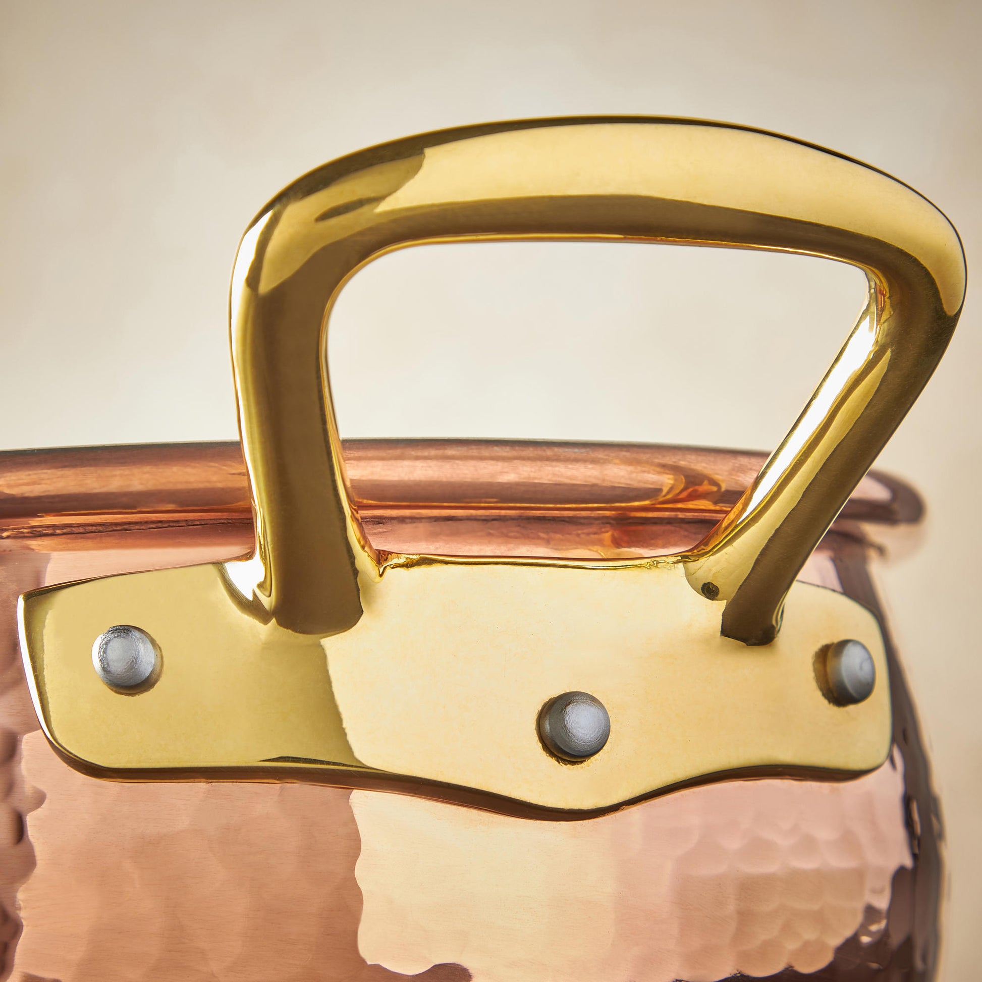 Beautiful bronze handle on Historia hammered copper cookware