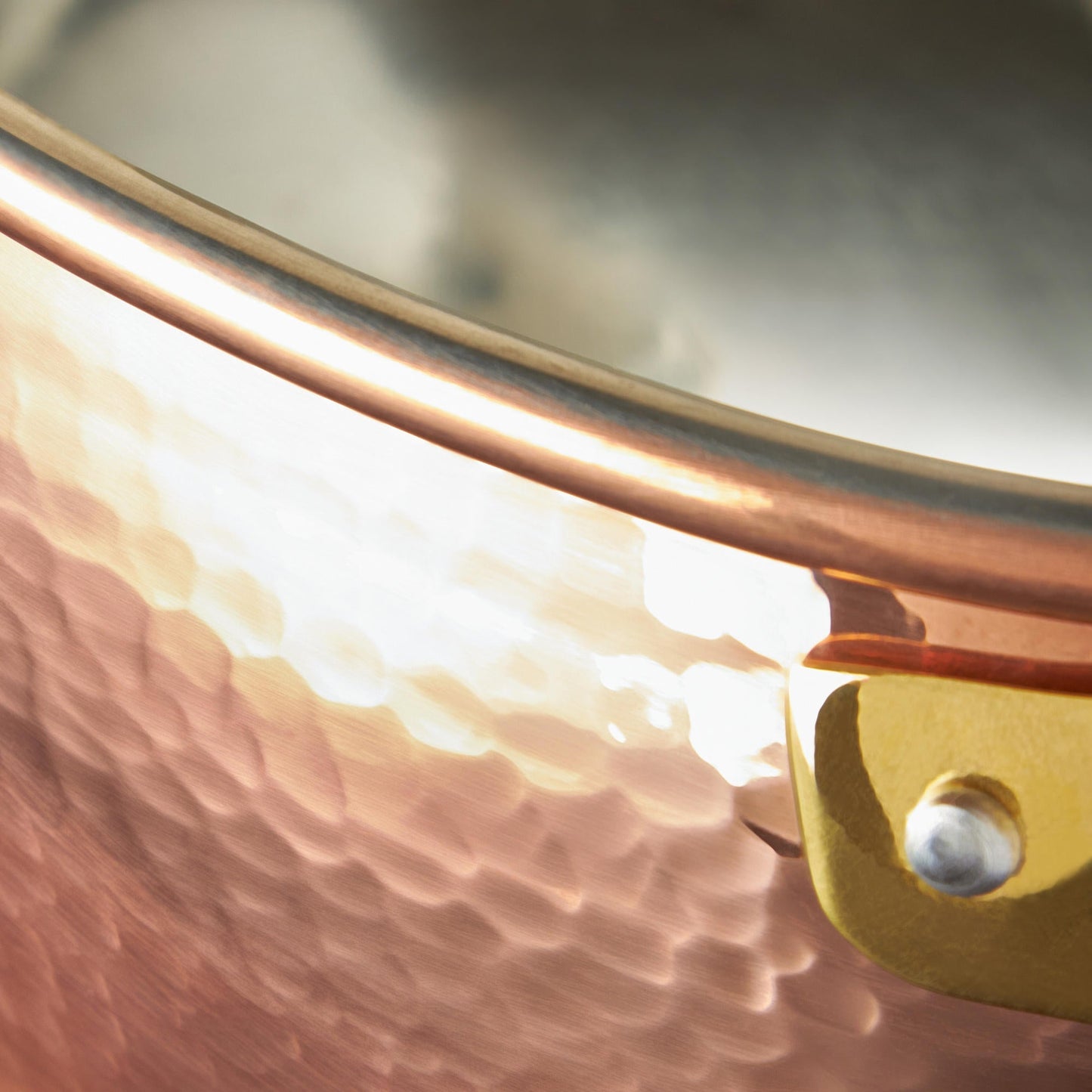 Signature hammering finish on copper Stockpot from Glamstore Historia, applied to ensure increased strength and lasting beauty