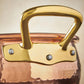 Beautiful bronze handle on Historia hammered copper cookware