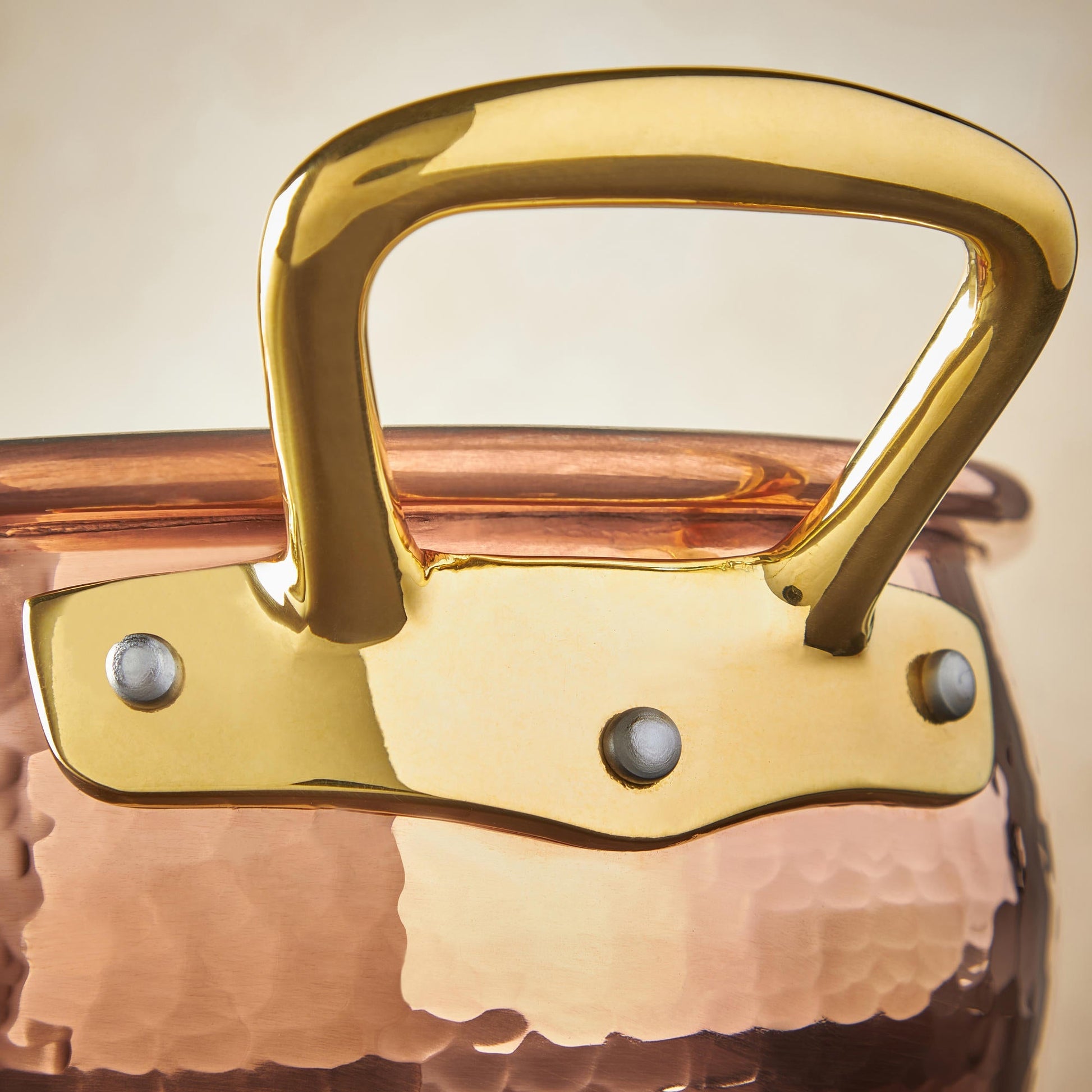 Beautiful bronze handle on Historia hammered copper cookware