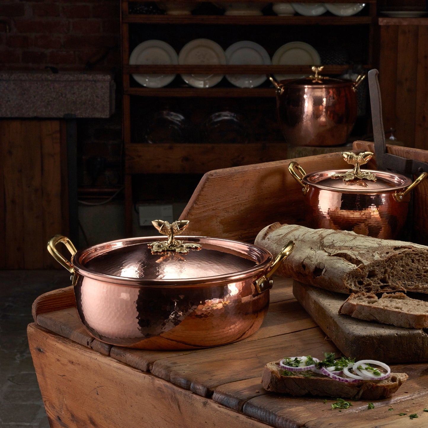 Hammered copper 6 Qt Braiser lined with high purity tin applied by hand over fire and bronze handles, from Glamstore Historia collection