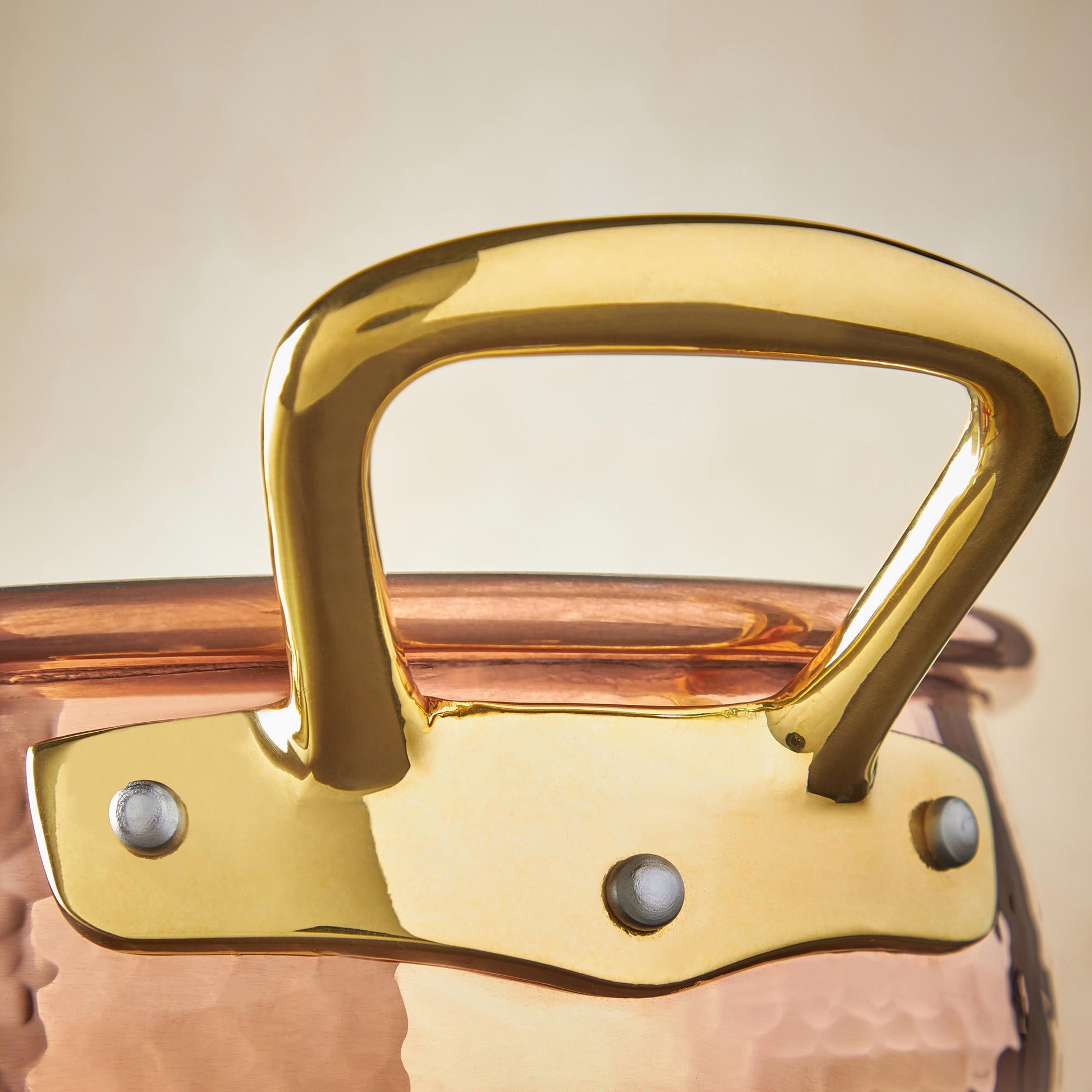 Beautiful bronze handle on Historia hammered copper cookware