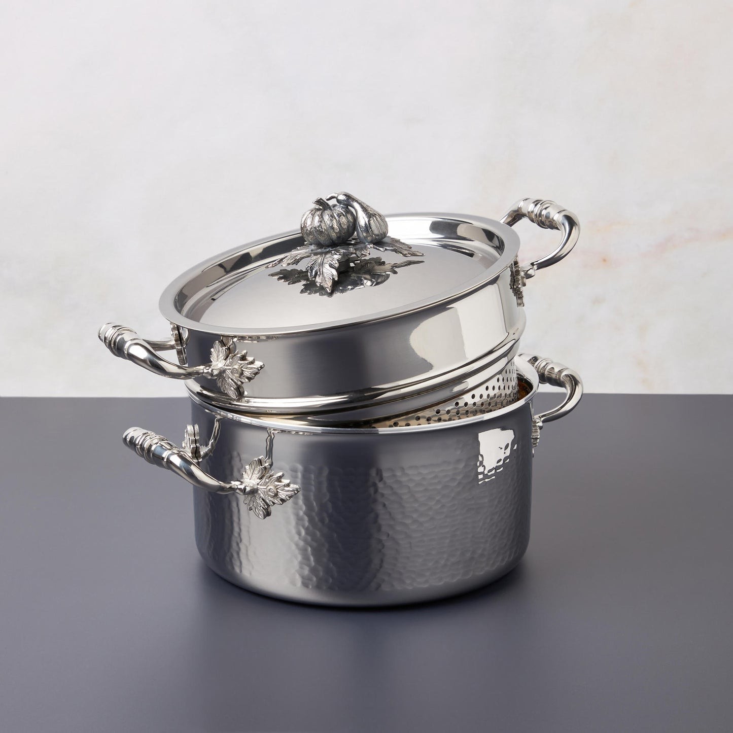 Opus Prima hammered clad stainless steel soup pot with decorated silver-plated lid knob finial