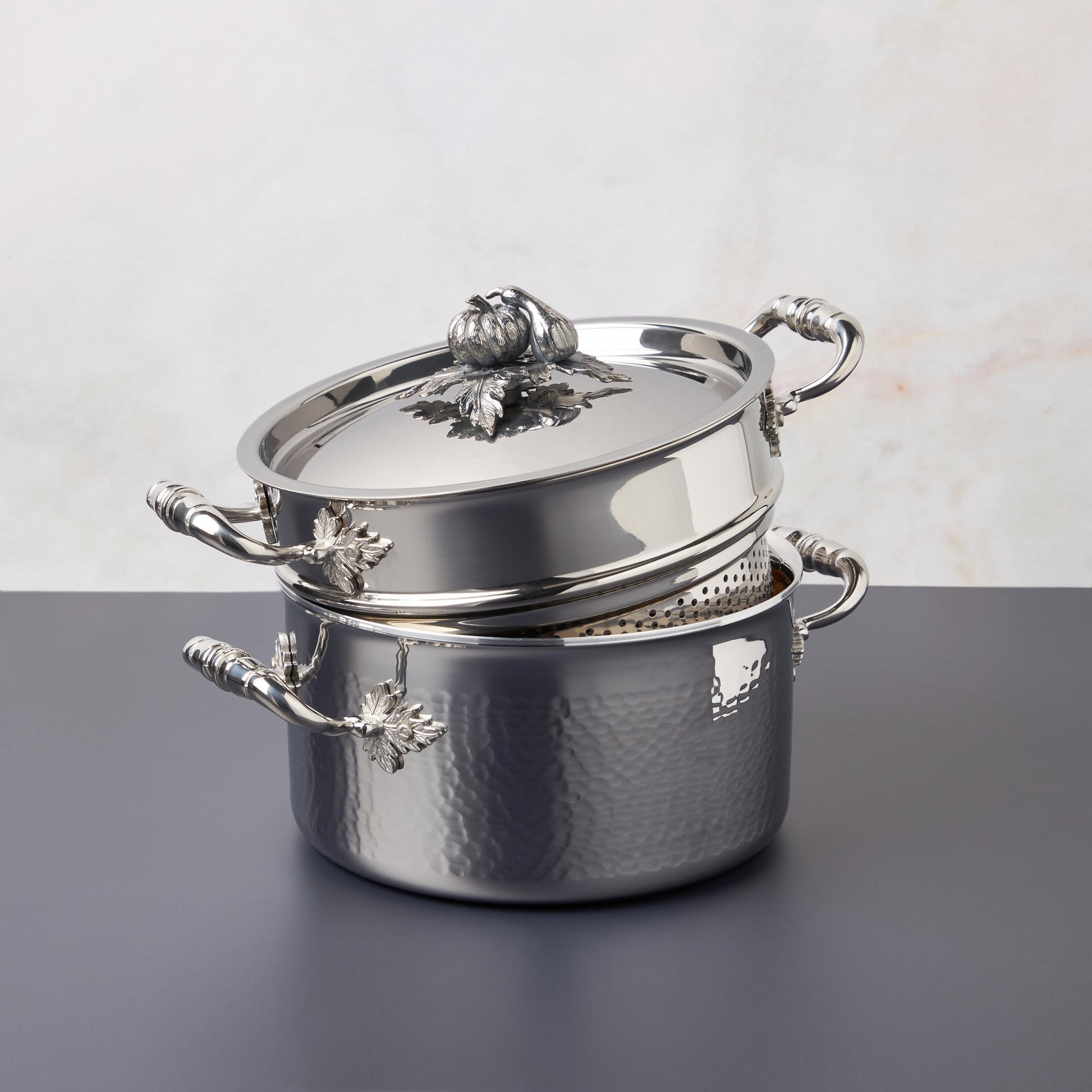 Opus Prima hammered clad stainless steel soup pot with decorated silver-plated lid knob finial