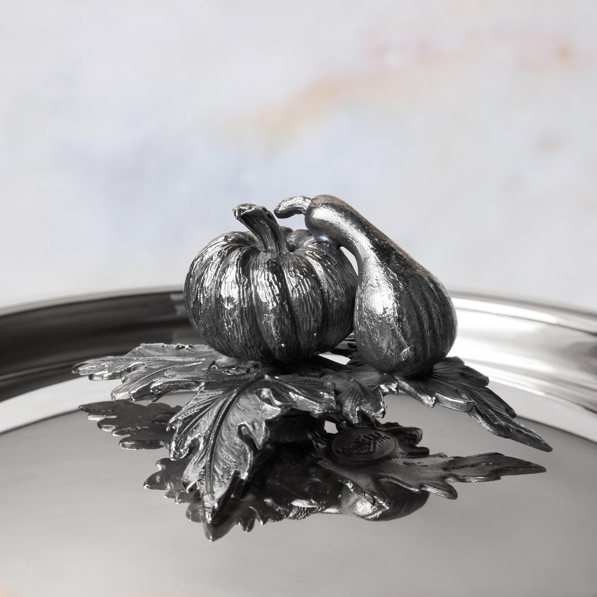 Decorated knob finial representing pumpkin and gourd, cast in solid bronze and silver plated, on Opus Prima stainless steel lid