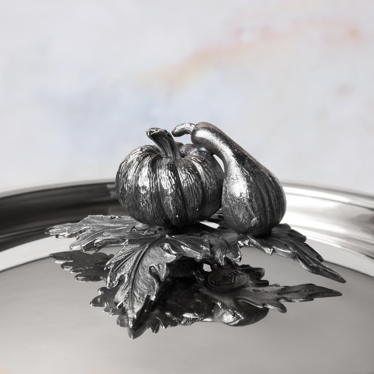 Decorated knob finial representing pumpkin and gourd, cast in solid bronze and silver plated, on Opus Prima stainless steel lid