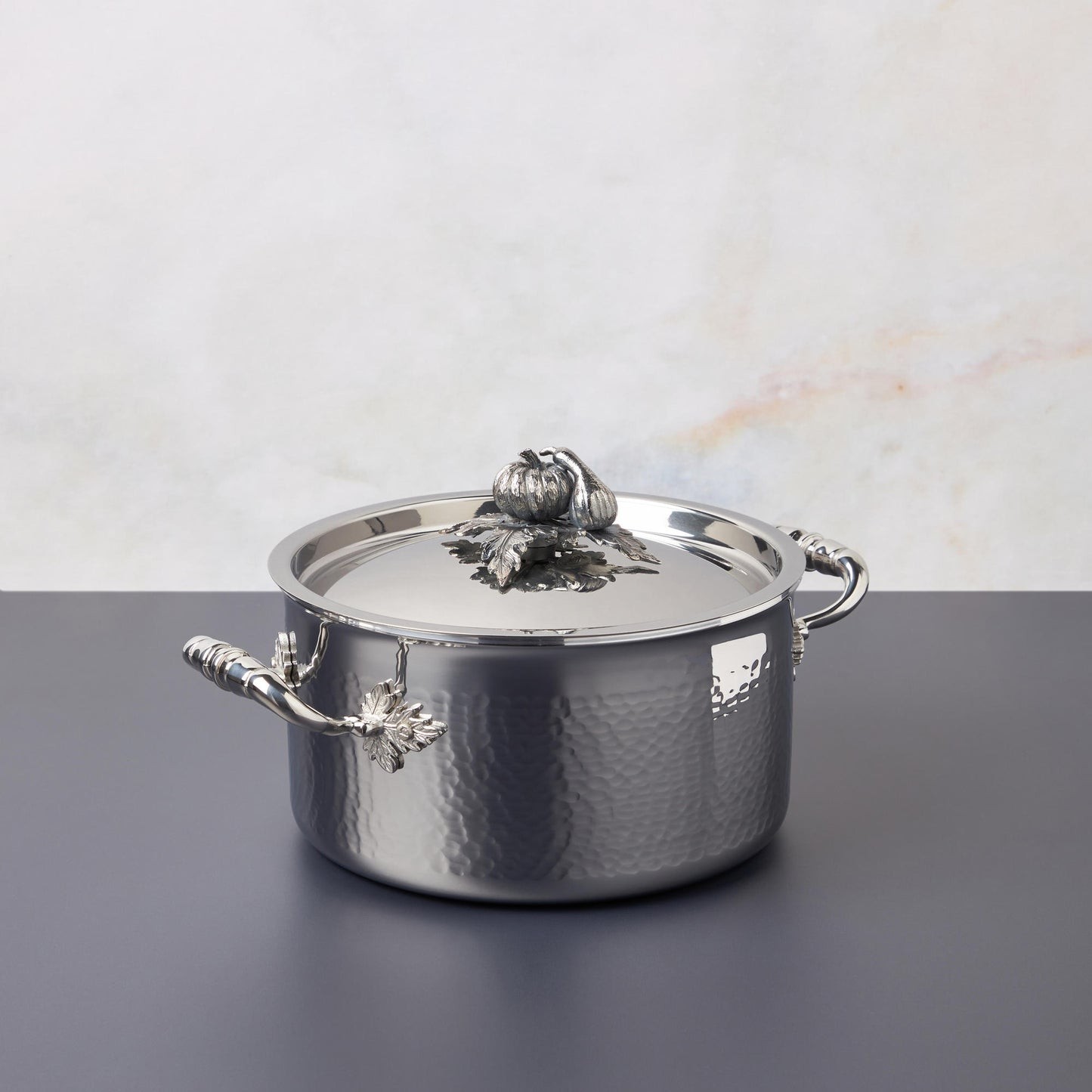 Opus Prima hammered clad stainless steel soup pot with decorated silver-plated lid knob finial