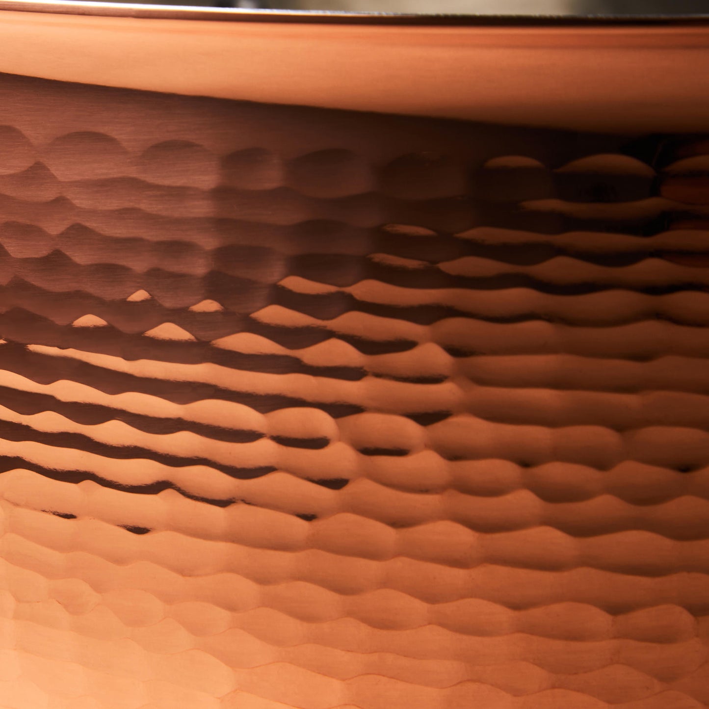 Hammering increases strength and beauty of copper clad with stainless steel  stockpot
