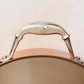 Comfortable lside handle in stainless steel with decorative inlaid copper coin