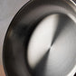 Sunray polished and hammered stainless steel lining in saucepan
