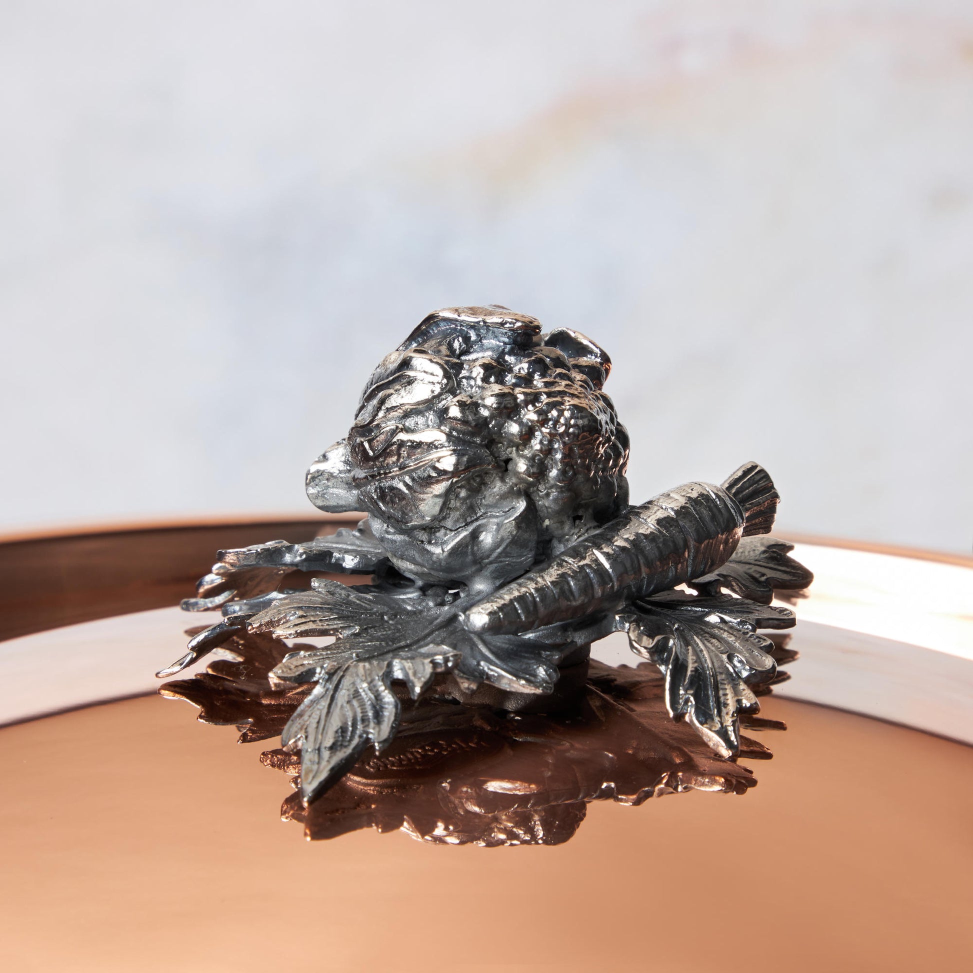 Decorated knob finial representing cauliflower and carrot, cast in solid bronze and silver plated, on Opus Cupra clad copper lid