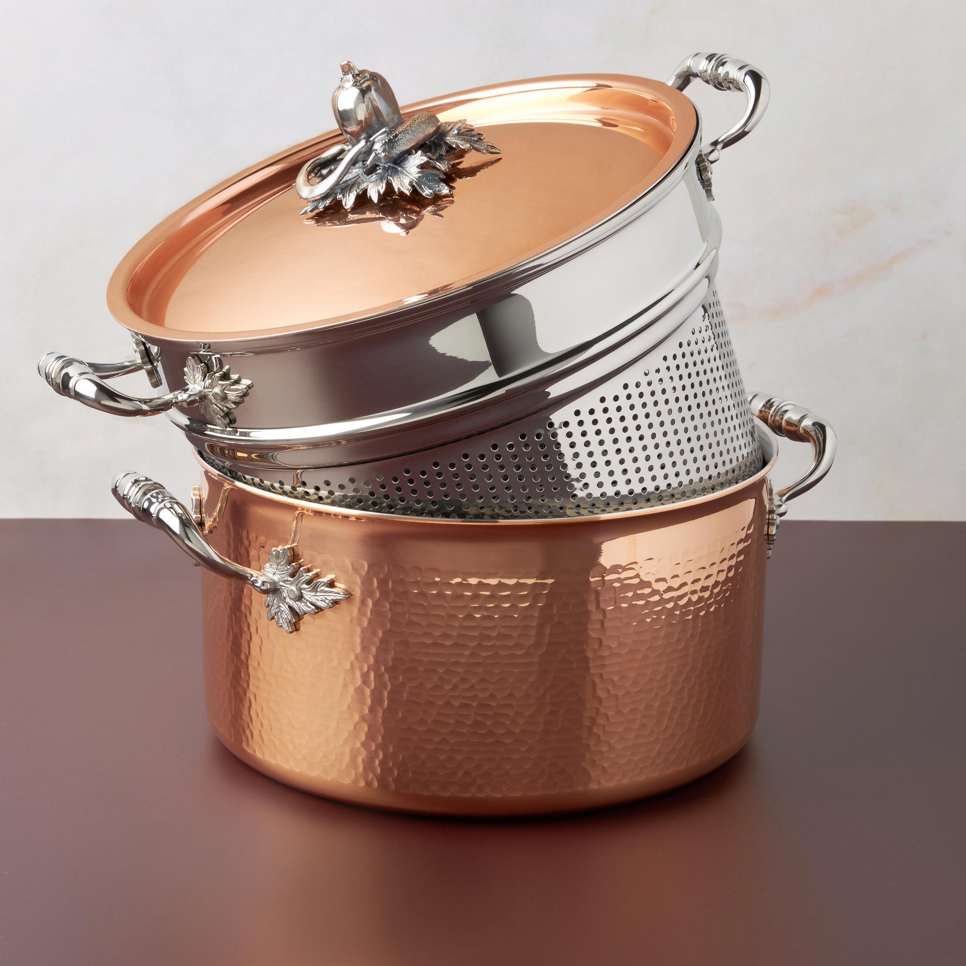 8qt Stockpot with Pasta Insert from the Opus Cupra collection. Crafted in hammered copper with stainless steel lining, and decorated silver-plated lid knob finial