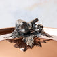 Decorated knob finial representing garlic and pepper, cast in solid bronze and silver plated, on Opus Cupra clad copper lid