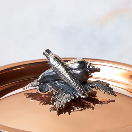 Decorated knob finial representing carrot and pepper, cast in solid bronze and silver plated, on Opus Cupra clad copper lid