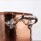 Beautiful stainless steel helper handle decorated with delicate leaves on Opus Cupra cookware