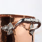 Beautiful stainless steel handle decorated with delicate leaves on Opus Cupra cookware