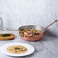 Hammered copper Chef's Pan lined with high purity tin applied by hand over fire and bronze handles, from Glamstore Historia collection