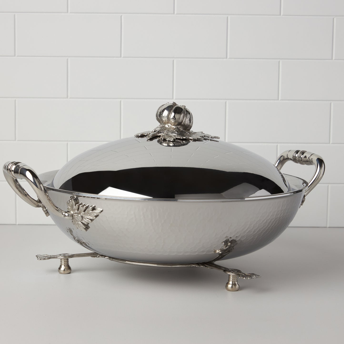 stainless steel trivet photographed with the Glamstore Opus Prima covered Wok