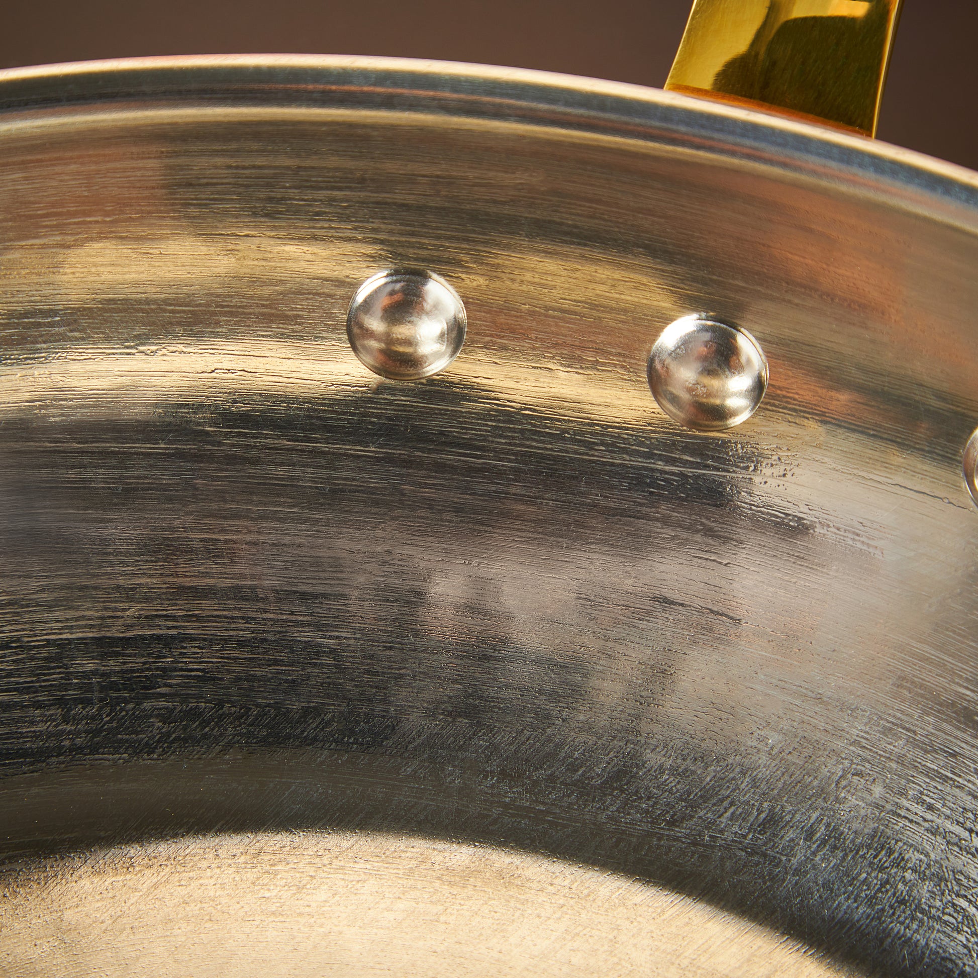 High purity, durable tin lining applied by hand over fire on solid hammered copper large chef pan from Glamstore Historia collection