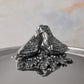 Decorated knob finial representing lovebirds cast in solid bronze and silver plated, on Opus Prima stainless steel lid