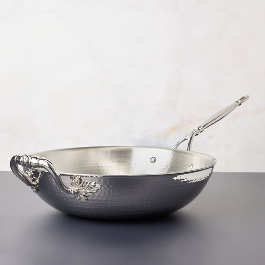 Opus Prima hammered clad stainless Open Wok decorated with delicate leaves on Opus Prima cookware