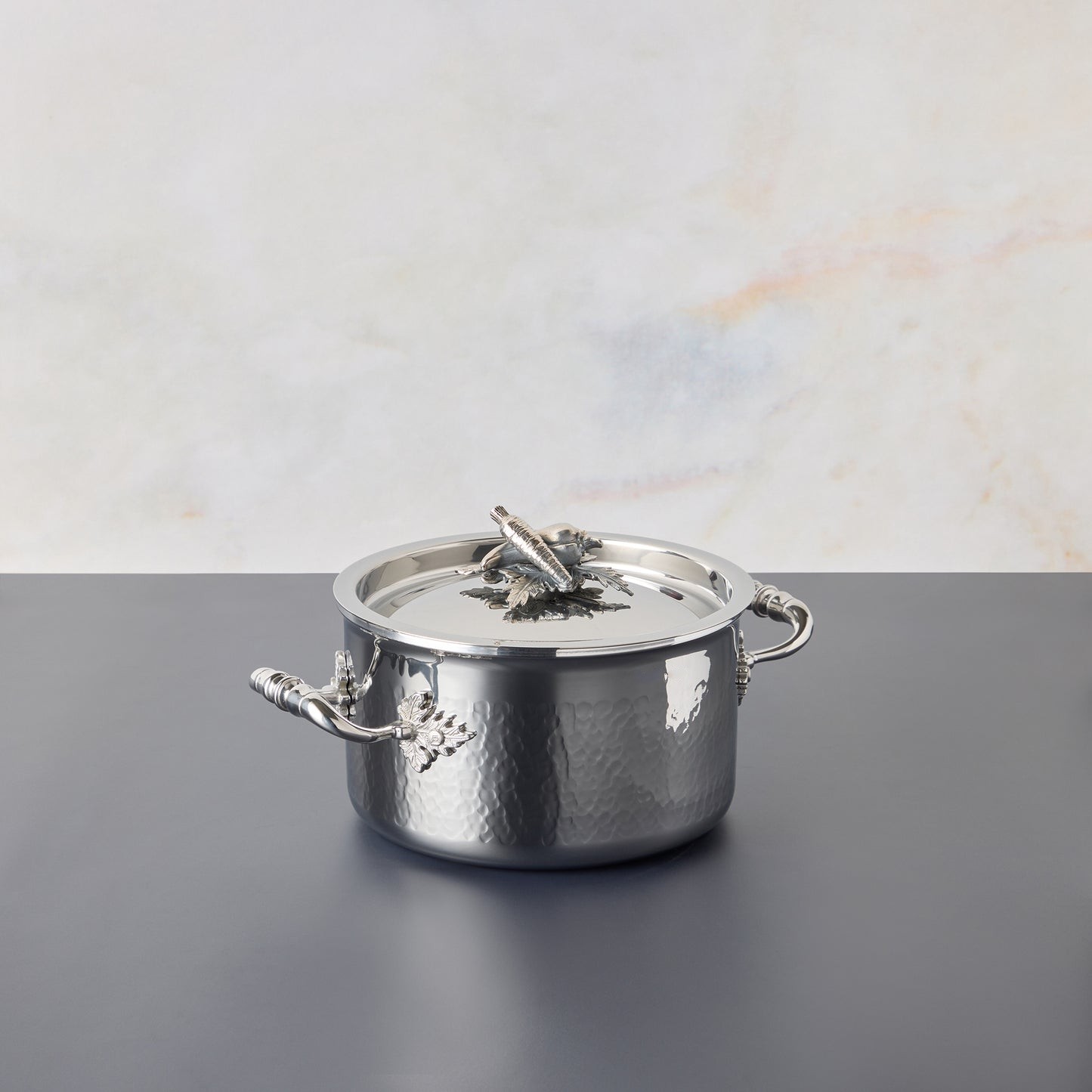 Opus Prima hammered clad stainless steel small saucepot with decorated silver-plated lid knob finial
