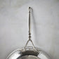 Beautiful stainless steel long stick handle decorated with delicate leaves on Opus Prima cookware