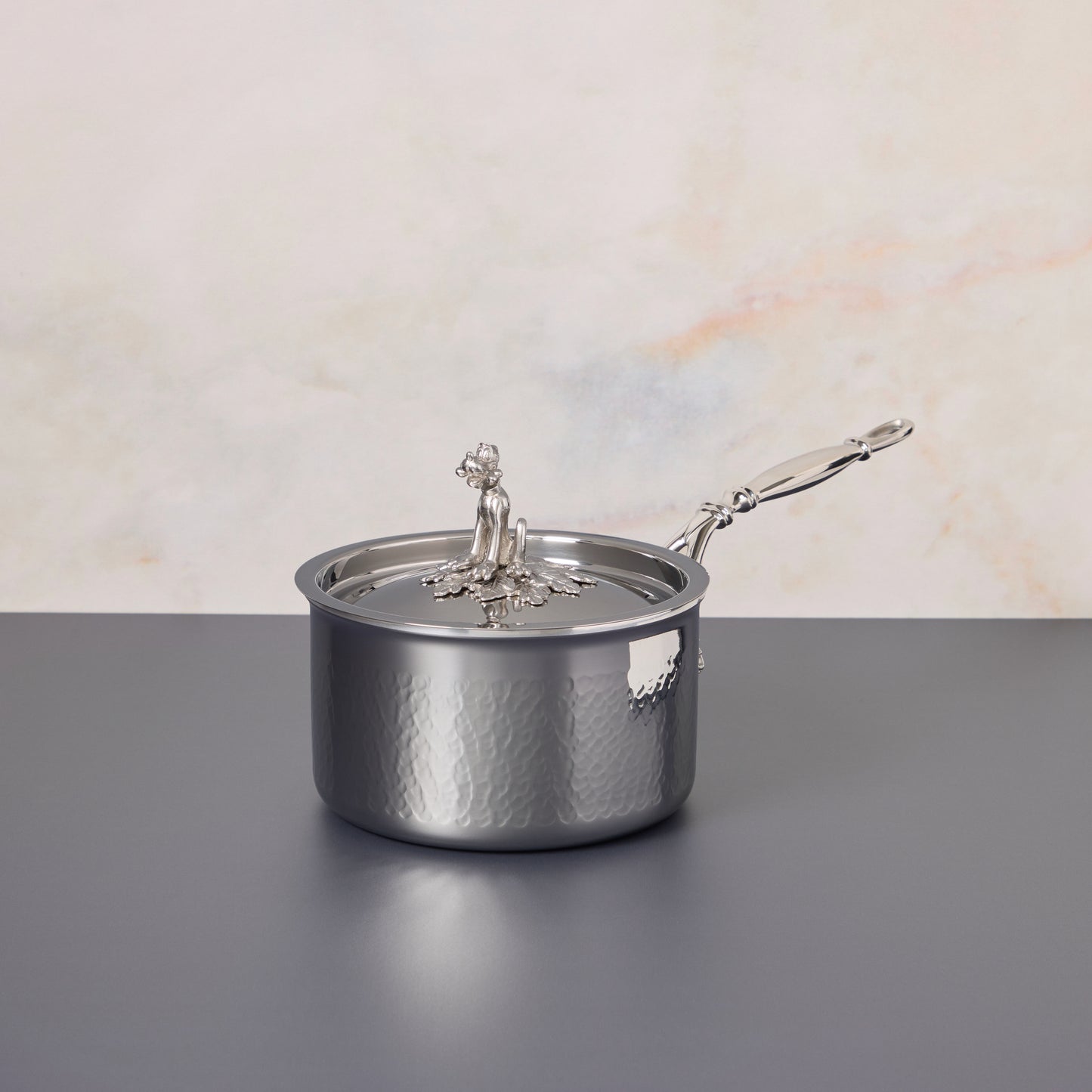 Opus Prima 2qt saucepan hammered clad stainless steel with special edition Disney-inspired knobs in stainless steel featuring Pluto
