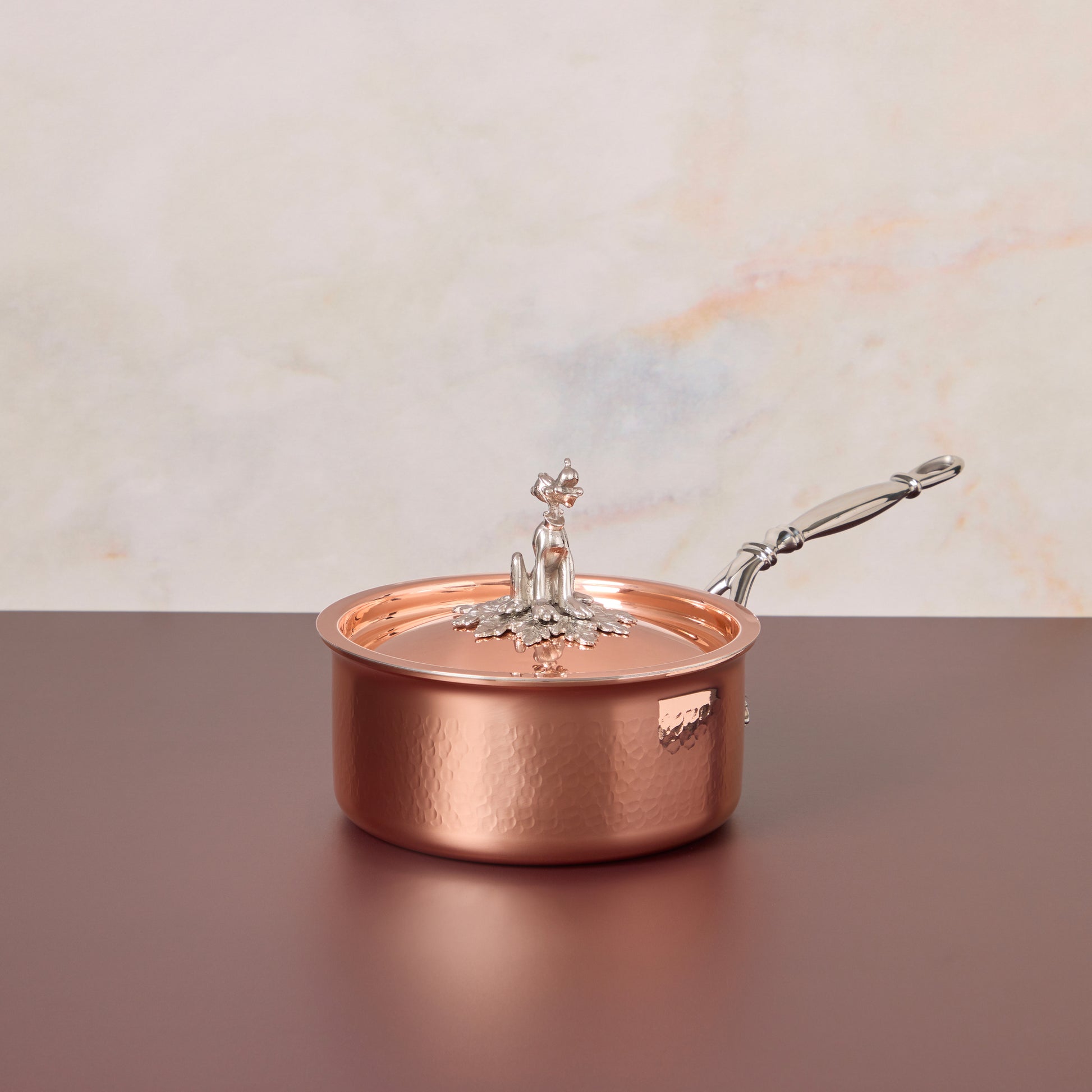 Opus Cupra 2 qt saucepan hammered copper with special edition Disney-inspired knobs in stainless steel featuring Pluto,
