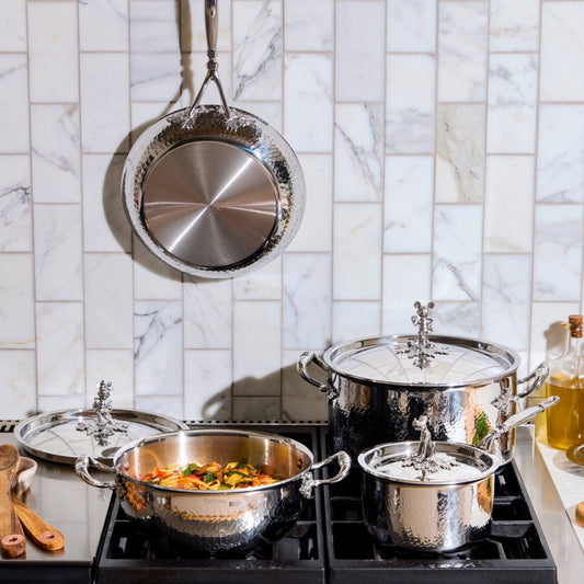 7-piece set Opus Prima hammered clad stainless steel with special edition Disney-inspired knobs in stainless steel featuring Mickey Mouse, Minnie Mouse, and Pluto