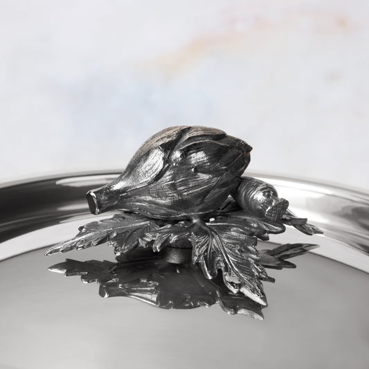 Decorated knob finial representing artichoke and carrot, cast in solid bronze and silver plated, on Opus Prima stainless steel lid